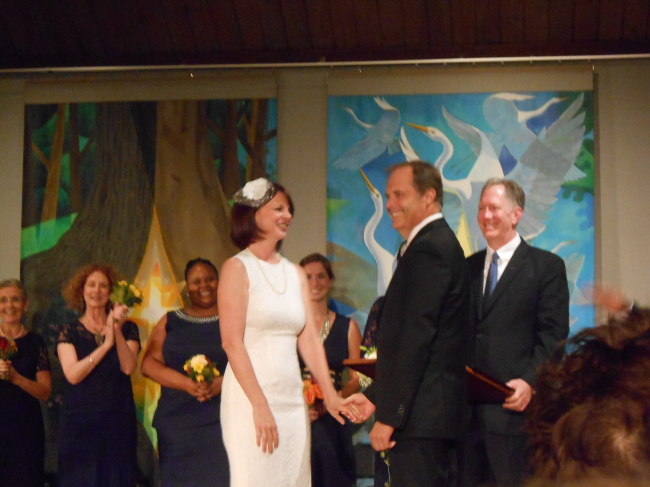 Actual bride Janet Luby (left) and her actual groom Steven Strawn (right) preparing to say "I Do" in front of the entire audience of the staged reading. 