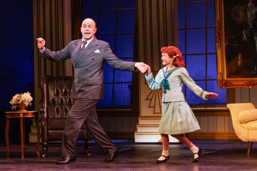 Christopher Swan (left) as Oliver Warbucks and Hazel Vogel (right) as Annie in Annie. 📷 Matthew Murphy