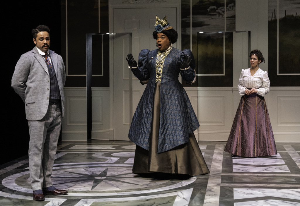 Paul Deo Jr (left) as Jack Worthing with David Ryan Smith (center) as Lady Bracknell and Veronica del Cerro (right) as Gwendolen Fairfax in The Importance of Being Earnest at Baltimore Center Stage ???? Michael Henniger.