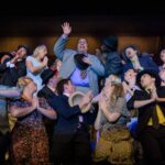 James Toler (center) as Nicely Nicely Johnson and the cast of Guys & Dolls at Howard County Summer Theatre ???? Neil Rubino