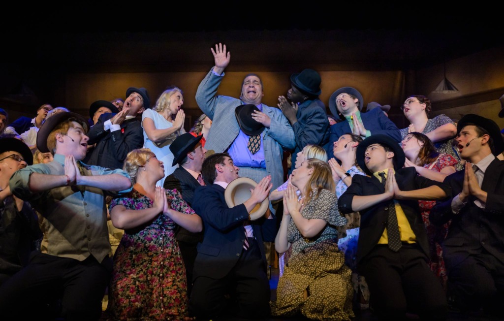 James Toler (center) as Nicely Nicely Johnson and the cast of Guys & Dolls at Howard County Summer Theatre 📸 Neil Rubino