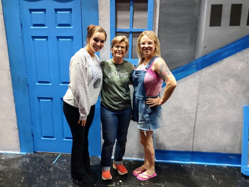 Rachel Miller (left) with Diane Smith (center) and Charlotte Evans (right) on the set of Beth Tfiloh Community Theatre's Mamma Mia