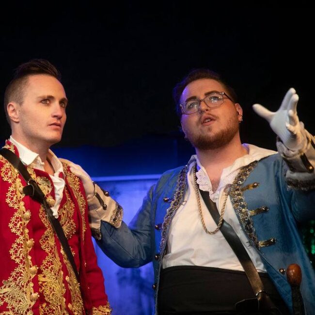 Jonathan Lightner (left) as Cinderella's Prince and Geraden Ward (right) as Rapunzel's Prince in Into The Woods at the Vagabond Players 📷 Shealyn Jae Photography