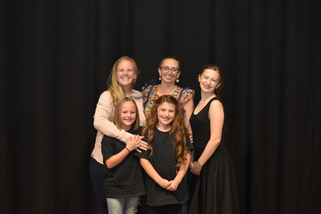 Family friends Stephanie Pirkey (top left) and Crystal Harrions (top center) grew up together and now their children- Riley Harrison (top right), Elliot Lookingland (lower left) and Lacey Harrison (lower right) are performing in 'A Christmas Carol' together 📷 Ashley Merrill