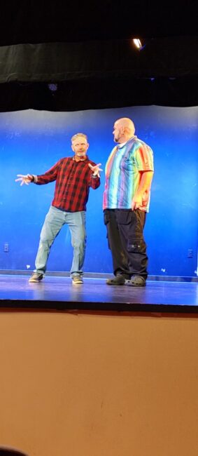 Steve Flickinger (left) rehearsing Jacob Marley with Bobby Mahoney (right) rehearsing Scrooge for Tidewater Players' A Christmas Carol