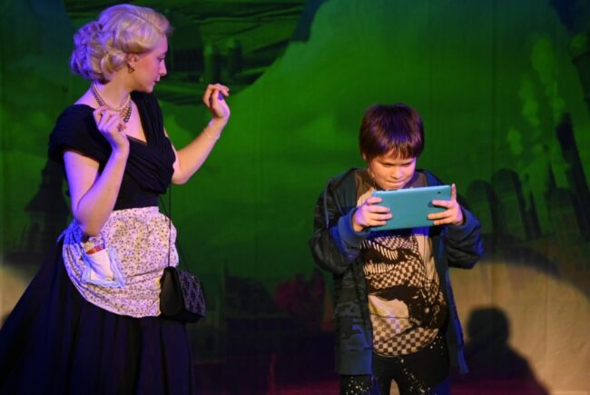 Gabrielle Gertner (left) as Mrs. Teavee and Ronald Gusso (right) as Mike Teavee in Charlie and The Chocolate Factory at Children's Playhouse of Maryland 📸 Imani McMillan