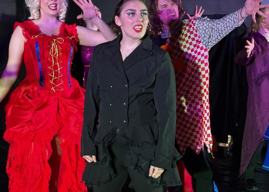 Tia Silver (left) as Fastrada, Dani Rizzo (center) as Leading Player, and Alex Gibbs (right) with the ensemble of Pippin at Small Town Stars Theatre Company 📷 Mort Shuman